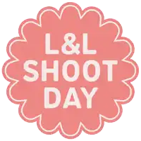 a pink sticker that says l & l shoot day on it