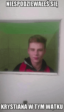 a picture of a young man behind a window with a caption that says niespodziewas sie krystiana w tym watku