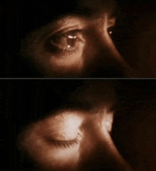 a close up of a person 's eyes with their eyes closed