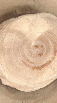 a close up of a pancake with a swirl on it