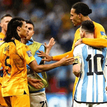 a group of soccer players one of whom is wearing a number 10 jersey