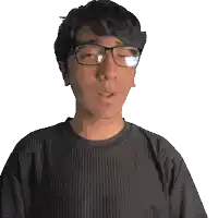 a man wearing glasses and a shirt that says benjamin on it