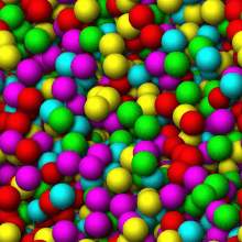 a bunch of colorful balls including red yellow and green