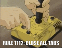 a person is pressing a button on a yellow device that says rule 1112 close all tabs .