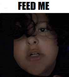 a picture of a person with the words feed me on the bottom