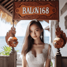 a woman stands in front of a sign that says balon168