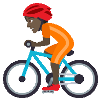 a person wearing a red helmet is riding a bike