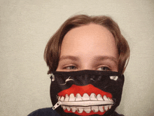 a person wearing a face mask with a zipper on it