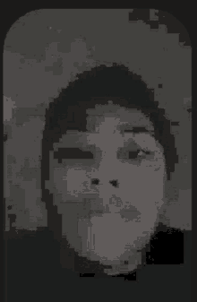 a close up of a person 's face in a pixelated image