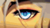 a close up of a woman 's eye with a blue pupil
