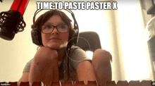 a young boy wearing headphones and glasses is sitting in front of a microphone with the words time to paste paster x above him