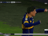 a soccer game is being played between boca and tal