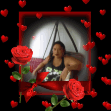 a picture of a woman in a hammock surrounded by hearts and roses