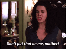 a woman says " don 't put that on me mother " while making a funny face