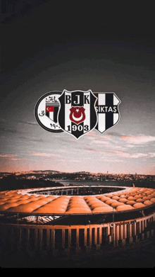 a picture of a stadium with the logos for bjk 1903 and siktaş