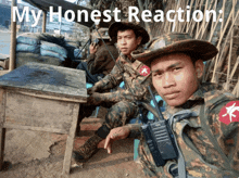 two soldiers sitting next to each other with the words my honest reaction below them