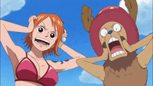 a woman in a bikini is standing next to a cartoon character with antlers