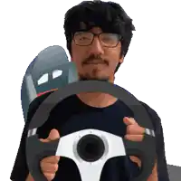 a man with glasses is holding a steering wheel in his hands