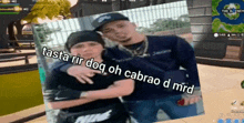 two men are hugging each other in a video game with the words " basta rir dog oh cabrao d mird " at the bottom