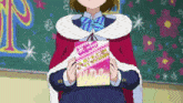 a girl in a cape is holding a book that says dvd