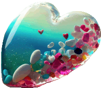 a heart shaped container filled with hearts and stones