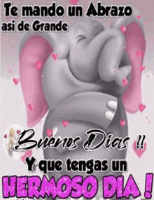 a cartoon elephant with pink wings is giving a hug and says `` te mando un abrazo '' .