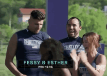 a group of people are standing next to each other and one of them is named fessi and esther