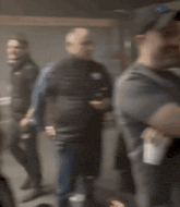 a blurry picture of a group of people in a room
