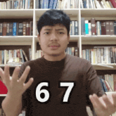 a man wearing a shirt with the number 67 on the front
