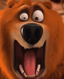 a close up of a cartoon bear with its mouth open and its tongue hanging out .