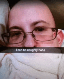 a man wearing glasses has a snapchat that says i can be naughty haha