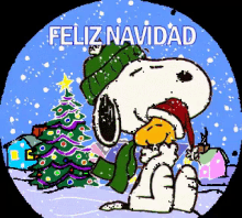 a cartoon of snoopy sitting in front of a christmas tree with the words " feliz navidad " above him