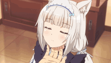 a girl with white hair and cat ears has her eyes closed and her hand on her chin