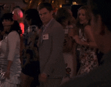 a man with a name tag that says dexter