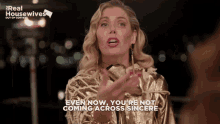 a woman says " even now you 're not coming across sincere " in front of a real housewives logo