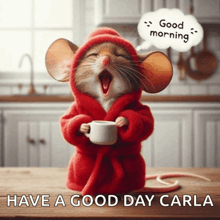 a mouse in a robe is holding a cup of coffee and says good morning have a good day carla