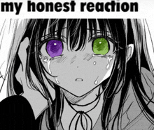 a black and white drawing of a girl with purple and green eyes crying