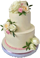 a wedding cake with white roses and pink flowers on it