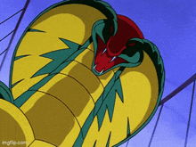 a close up of a cartoon snake with a blue sky in the background ..