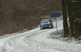 a car is driving down a snowy road with the words cry about it written below it