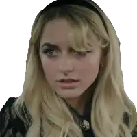 a blonde woman with a black headband on her head