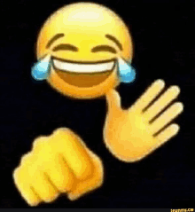 a laughing emoji with tears coming out of its eyes and a fist in front of it .