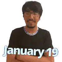 a man wearing glasses and a black shirt with the words january 19 on it