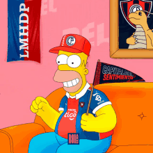 homer simpson sitting on a couch with a flag that says capital del sentimiento