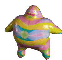 a colorful cartoon character with a tongue sticking out of its mouth