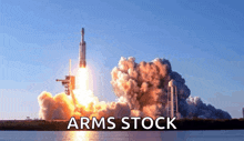 a rocket is being launched with the words " arms stock " written below it