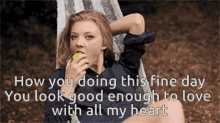 a woman is sitting in a hammock eating an apple with a caption that says how you doing this fine day