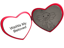 a heart shaped mirror says wawa my beloved