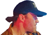 a man wearing a baseball cap with a skull and crossbones on it