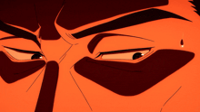 a close up of a man 's face with a very angry expression